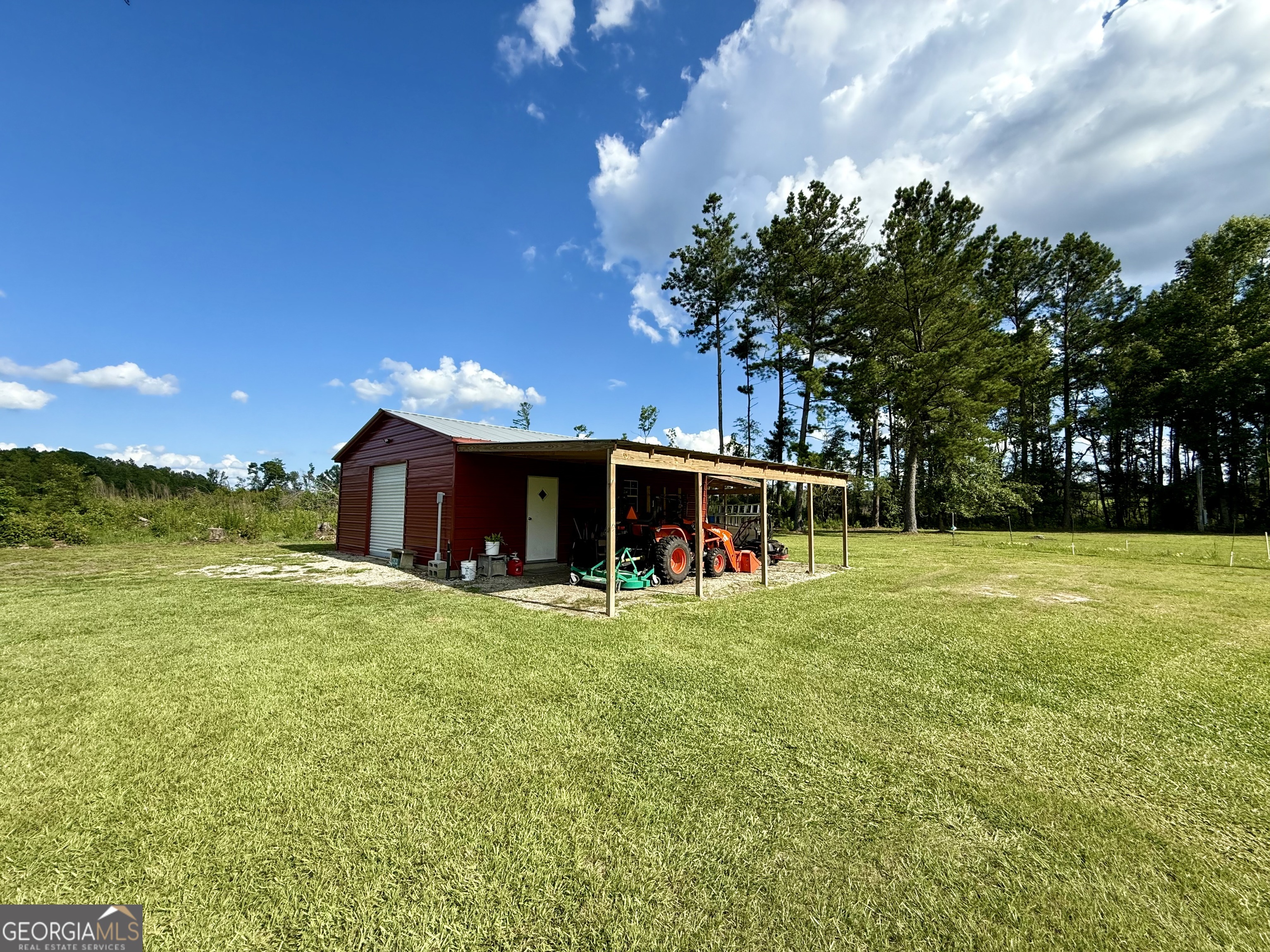 1430 Old Poor Robin Road Sylvania, GA 30467 - Photo 28 of 30 a view of a house with a yard