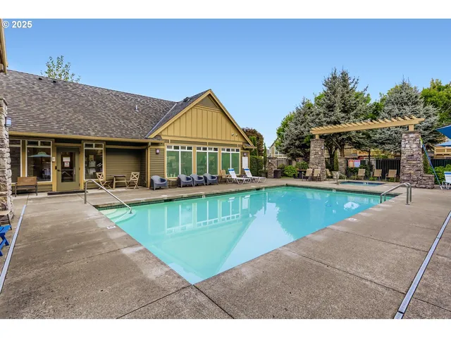 a room with gym equipment and large mirror