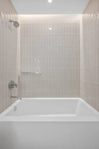 a bathroom with a bathtub