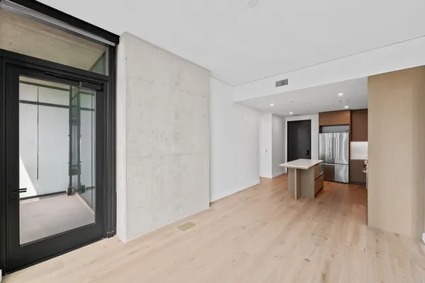 a view of a living room and dining room
