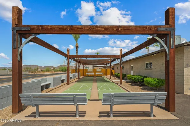 a view of swimming pool with outdoor seating