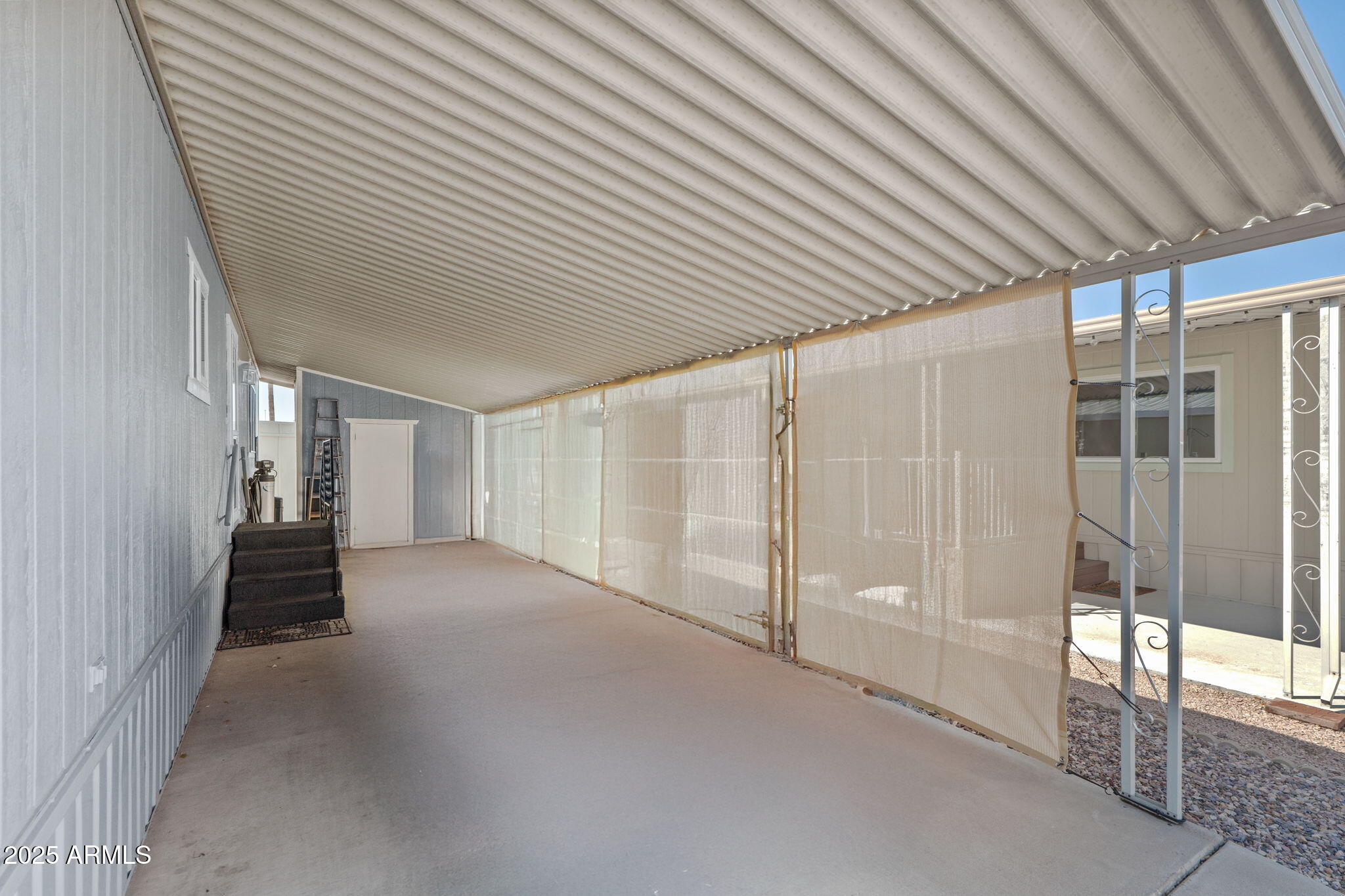 269 North Winchester Road, Unit 63 Apache Junction, AZ 85119 - Photo 18 of 18 a view of empty room with wooden floor
