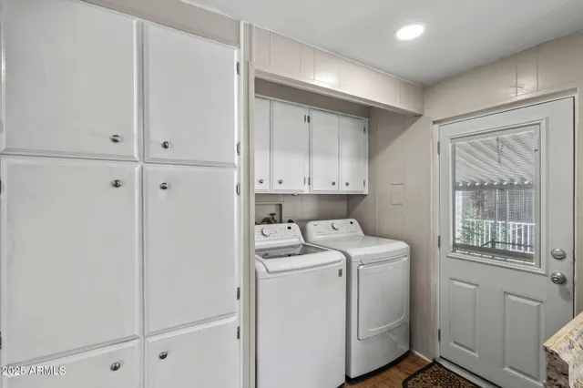 a view of utility room with washer and dryer