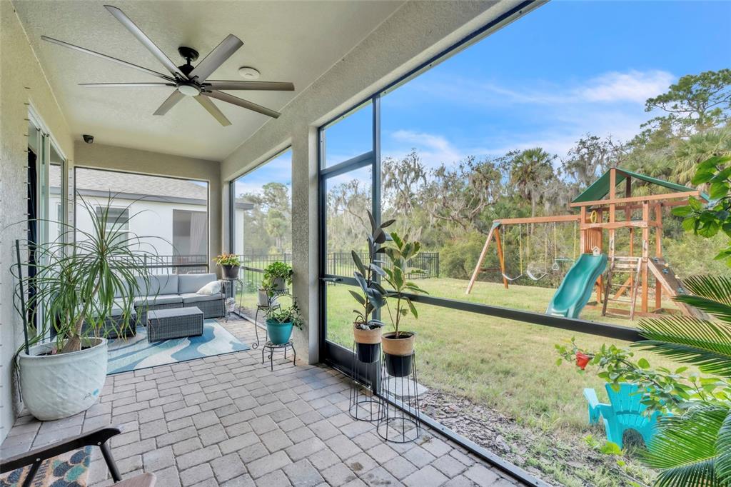 14412 20th Street East Parrish, FL 34219 - Photo 17 of 57 a living room with furniture and a large window