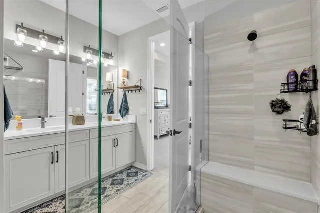 a playing room with toys and a flat screen tv