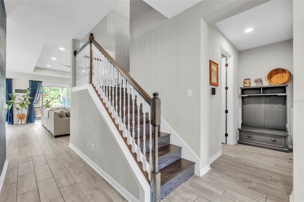 14412 20th Street East Parrish, FL 34219 - Photo 33 of 57 a view of a hallway view with staircase and living room