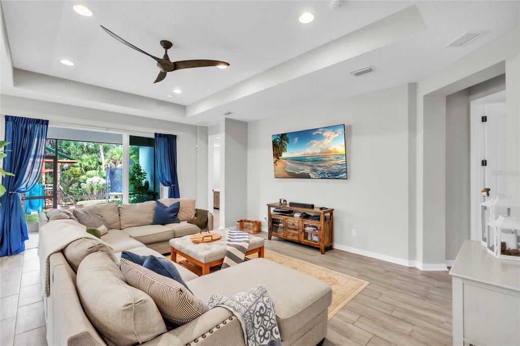 14412 20th Street East Parrish, FL 34219 - Photo 4 of 57 a living room with furniture and a large window