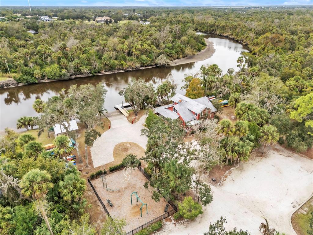 14412 20th Street East Parrish, FL 34219 - Photo 48 of 57 an aerial view of residential houses with outdoor space
