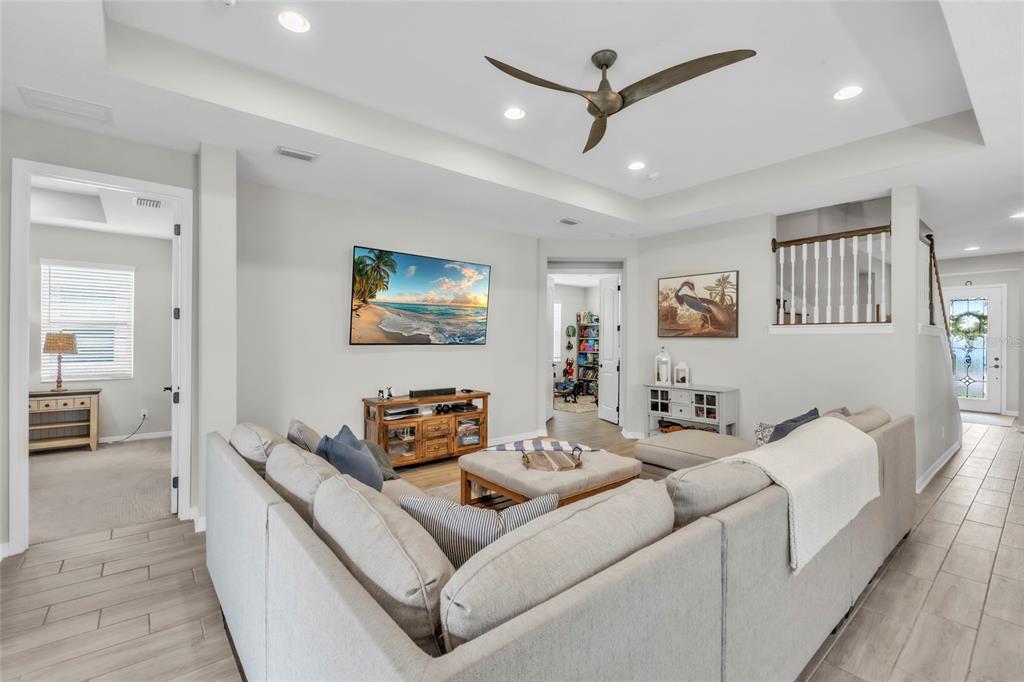14412 20th Street East Parrish, FL 34219 - Photo 7 of 57 a living room with furniture and a ceiling fan
