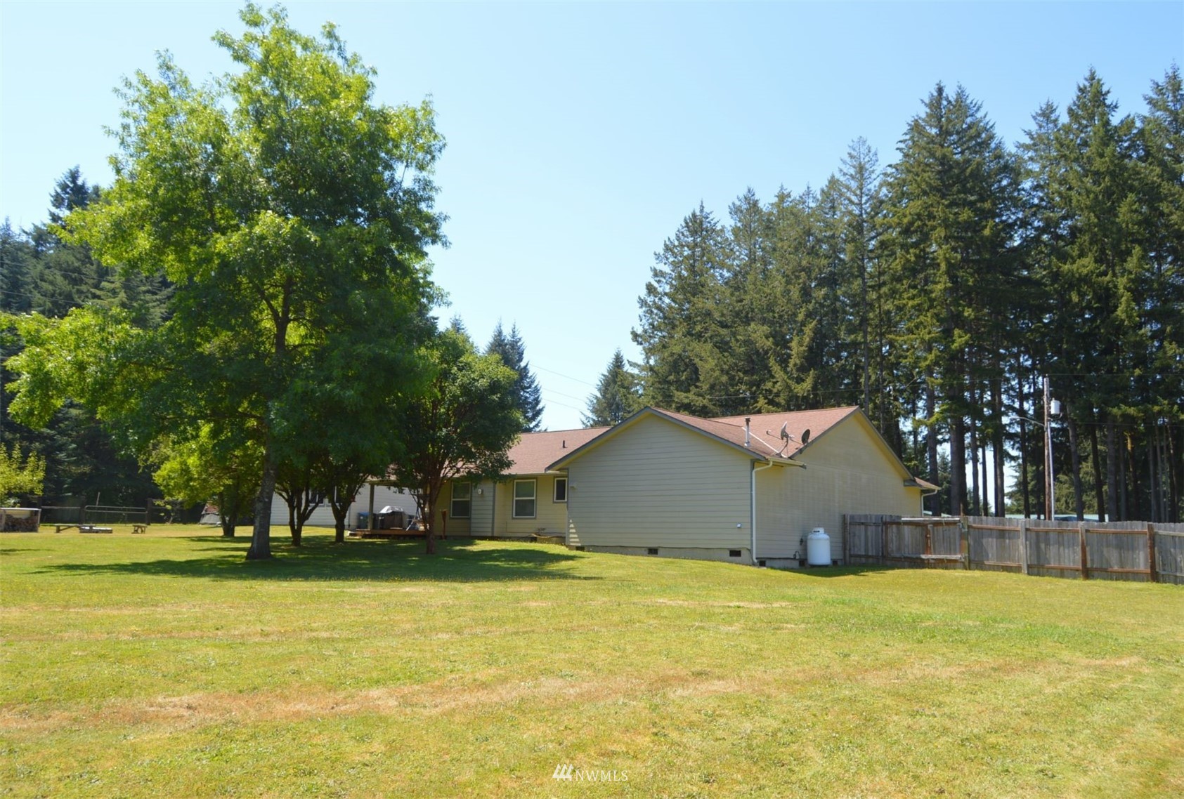 132 North Prairie Road Chehalis, WA 98532 - Photo 29 of 40 a view of a house with pool and a trees