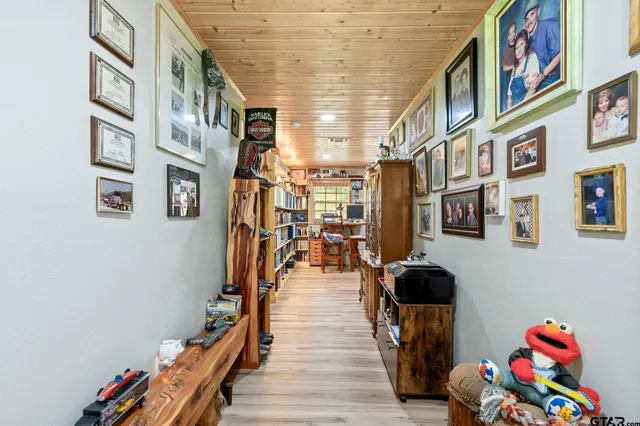 a bed room with a bed window and a dresser
