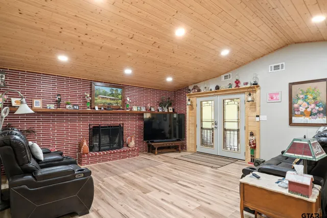 a view of house with wooden floor and outdoor space