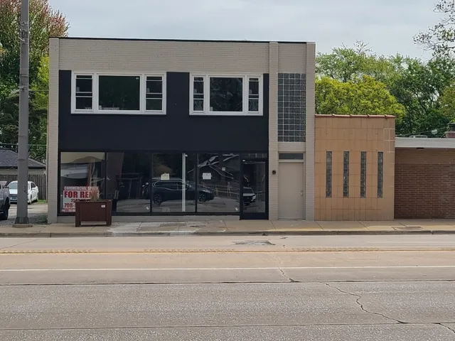 a building exterior with stairs and windows