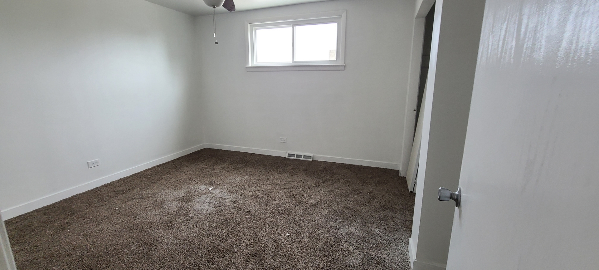 14751 Pulaski Road Midlothian, IL 60445 - Photo 12 of 18 an empty room with a window