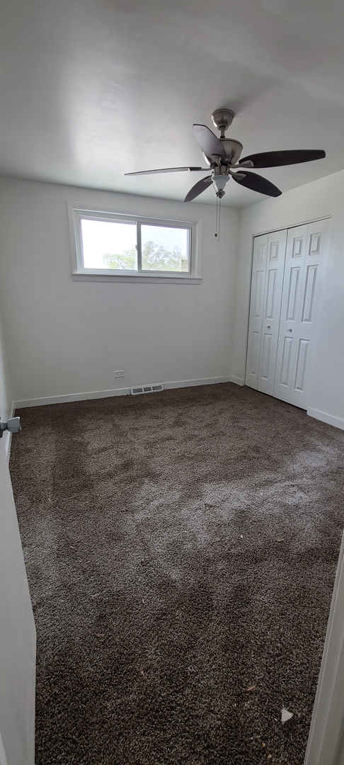 14751 Pulaski Road Midlothian, IL 60445 - Photo 14 of 18 an empty room with windows