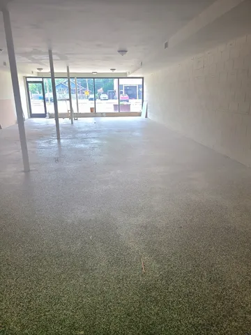 a view of a hallway with an empty room