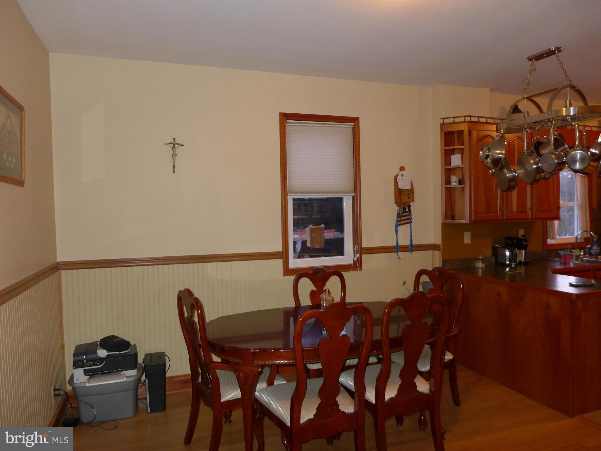 14633 Pennersville Road Cascade, MD 21719 - Photo 3 of 29 a view of a dining room with furniture