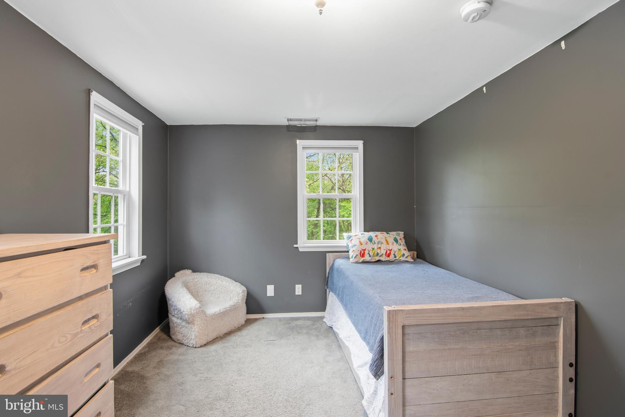 18708 York Road Parkton, MD 21120 - Photo 25 of 59 a bedroom with a bed and a window