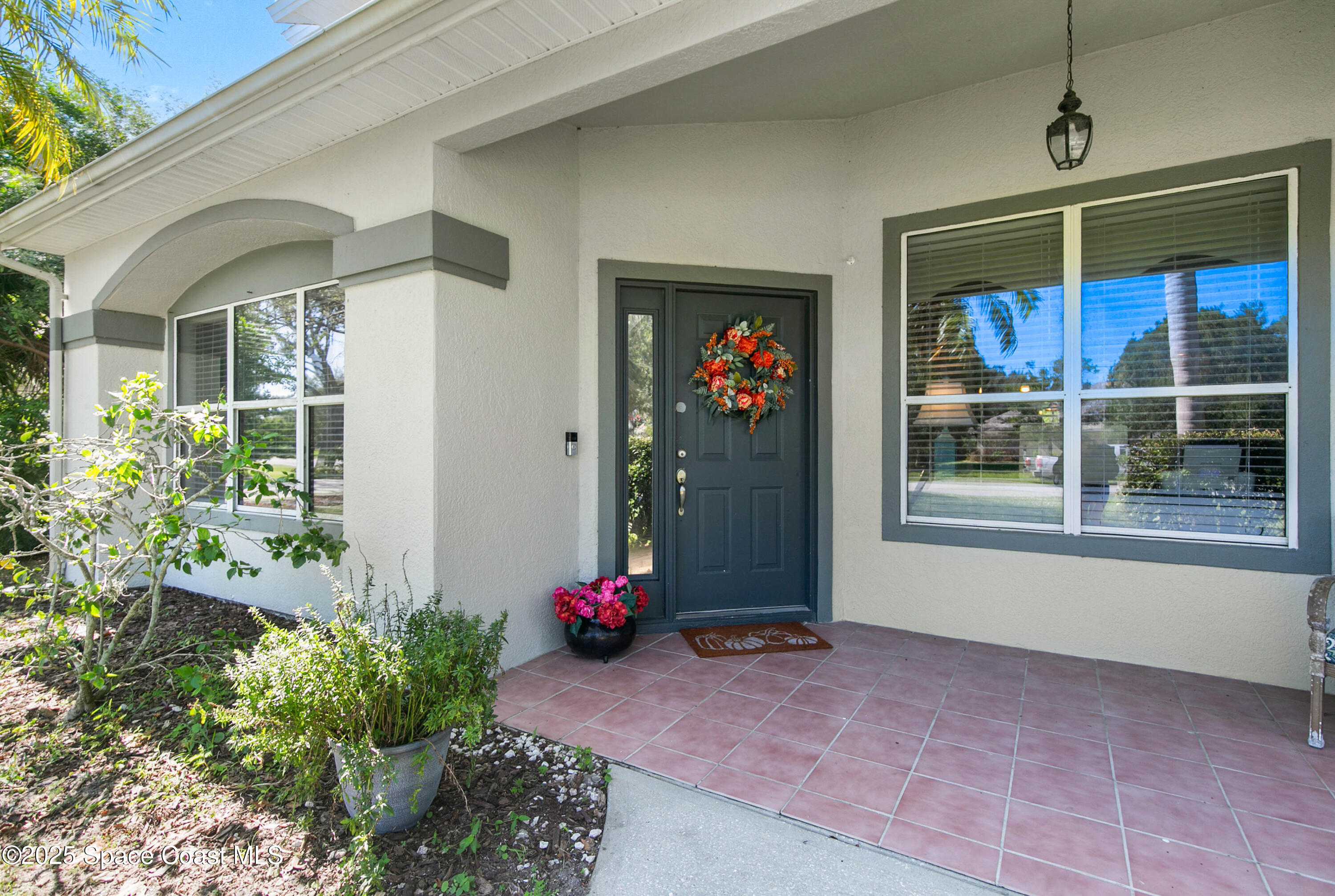 3530 Big Pine Road Melbourne, FL 32934 - Photo 3 of 39 a front view of a house