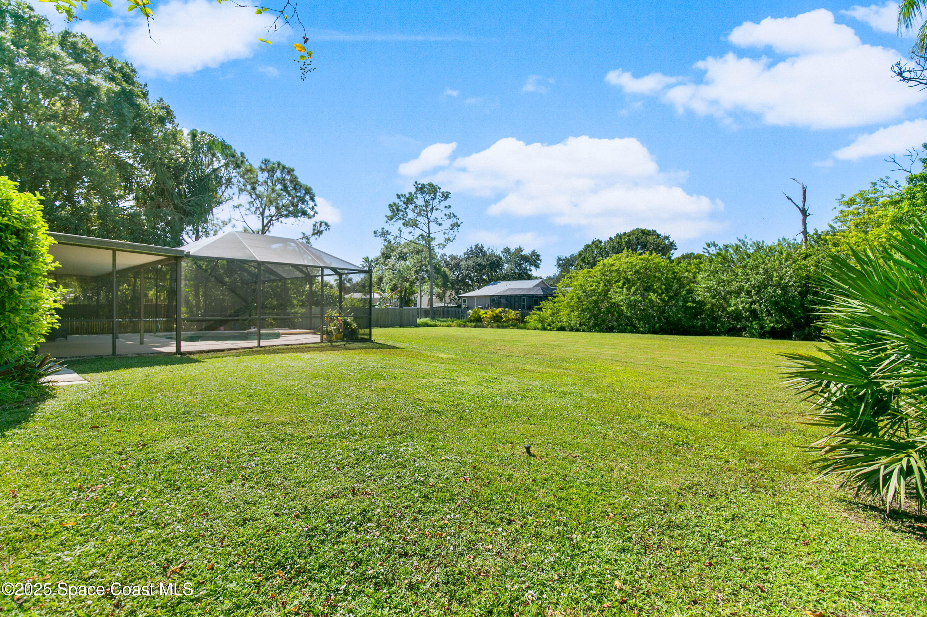 3530 Big Pine Road Melbourne, FL 32934 - Photo 35 of 39 a view of a garden with a slide