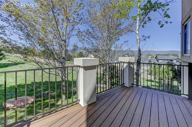 18465 Lower Lake Road Monument, CO 80132 - Photo 4 of 12 Deck off the Kitchen - updated with composite - amazing views