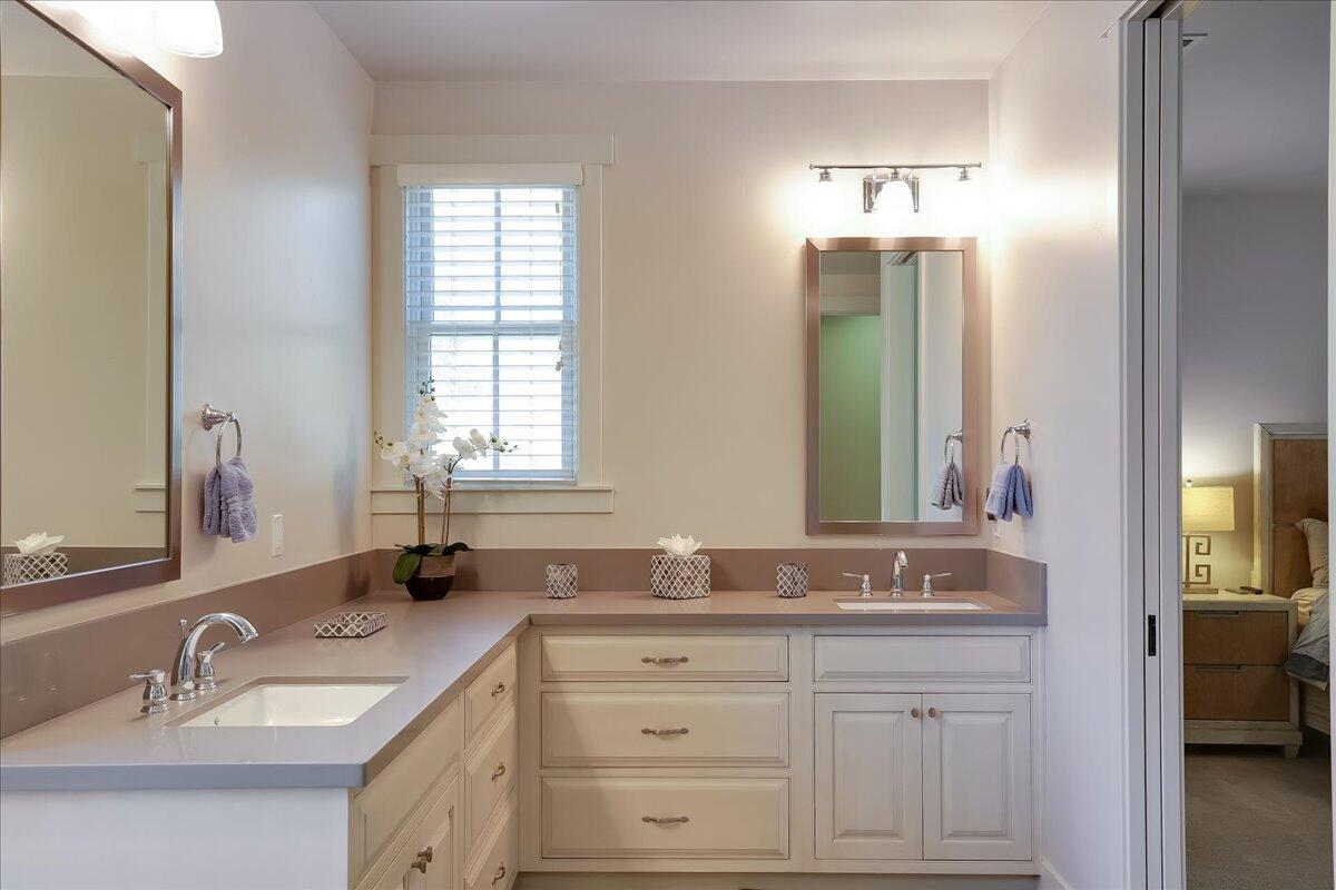 1030 Cambridge Drive Santa Barbara, CA 93111 - Photo 20 of 35 a bathroom with double sink and a mirror