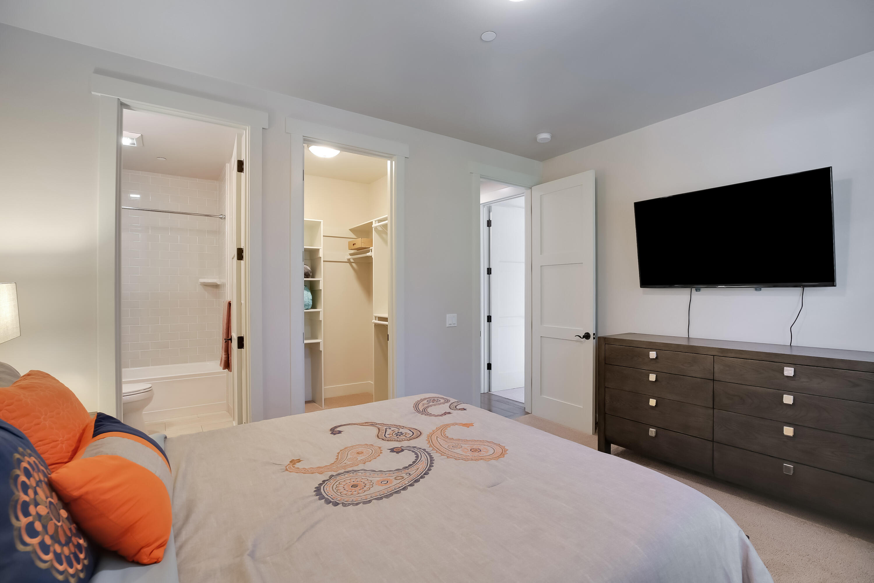 1030 Cambridge Drive Santa Barbara, CA 93111 - Photo 23 of 35 a bedroom with a bed and a flat screen tv