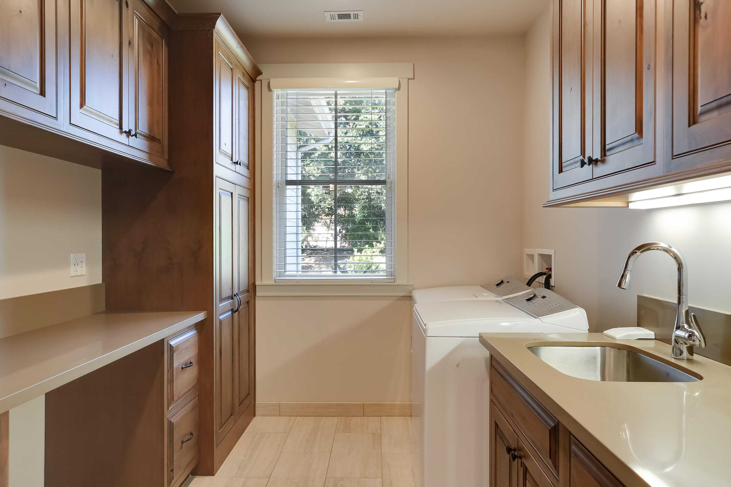 1030 Cambridge Drive Santa Barbara, CA 93111 - Photo 29 of 35 a kitchen with a sink cabinets and window