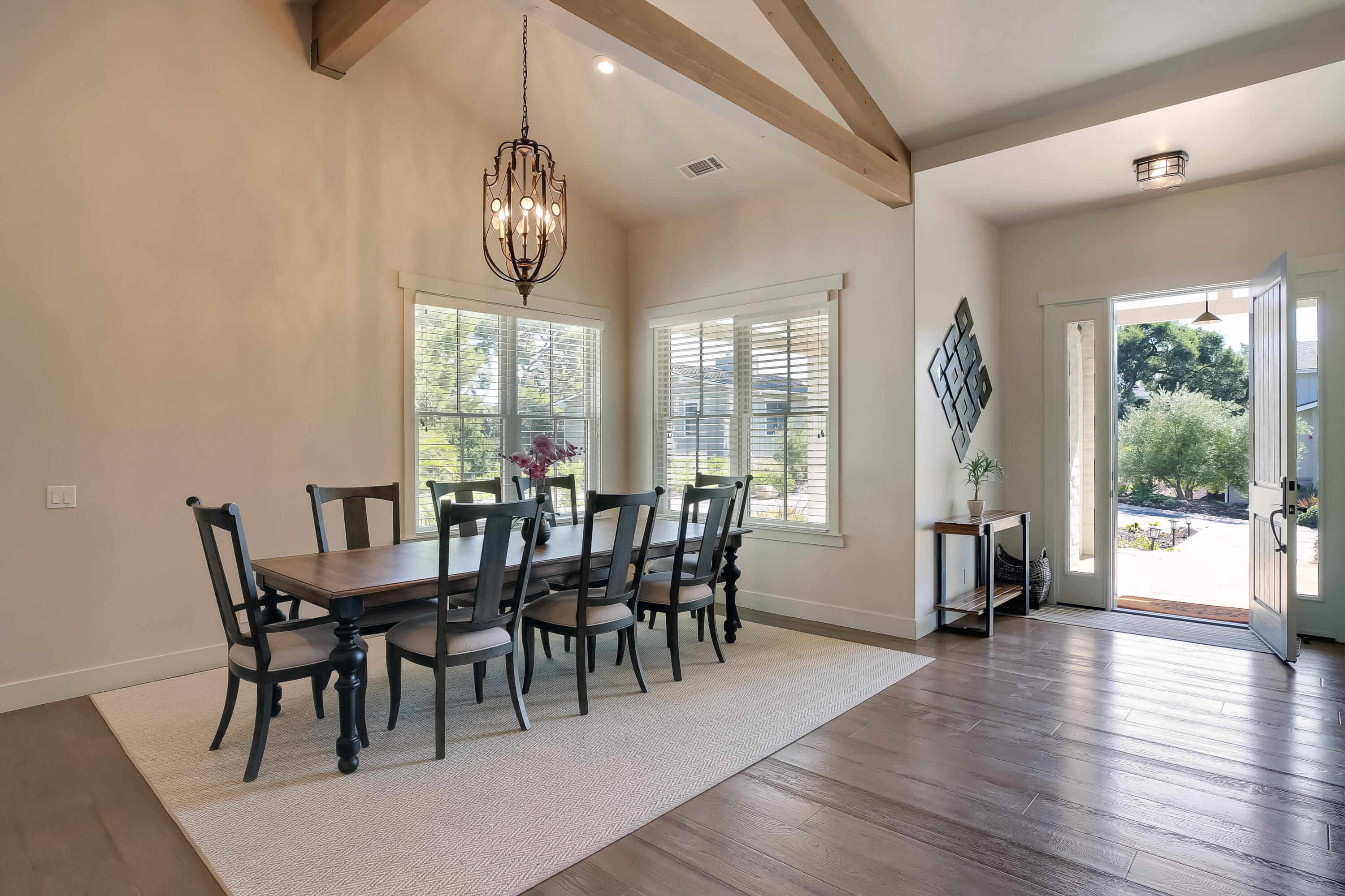 1030 Cambridge Drive Santa Barbara, CA 93111 - Photo 6 of 35 a view of a dining room with furniture window and wooden floor
