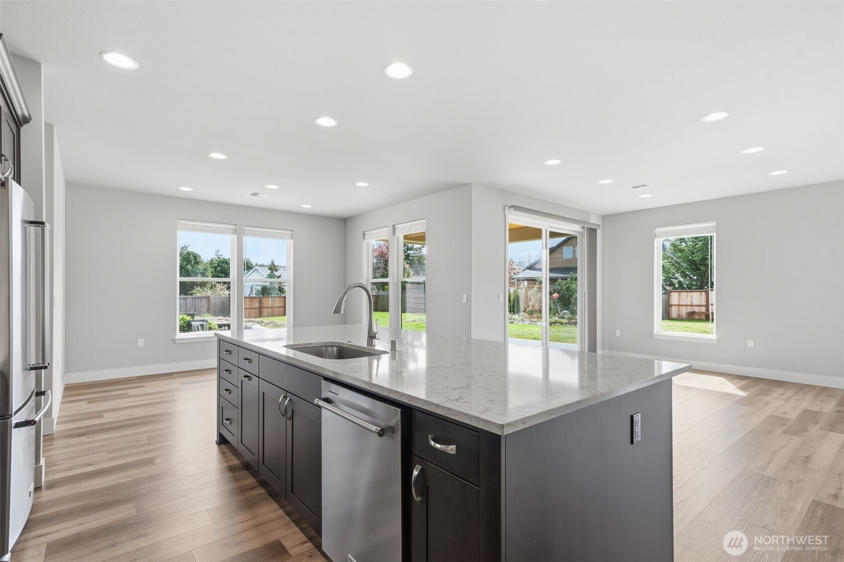 35 Viking Way Sequim, WA 98382 - Photo 17 of 39 a kitchen with stainless steel appliances granite countertop a sink and a large window
