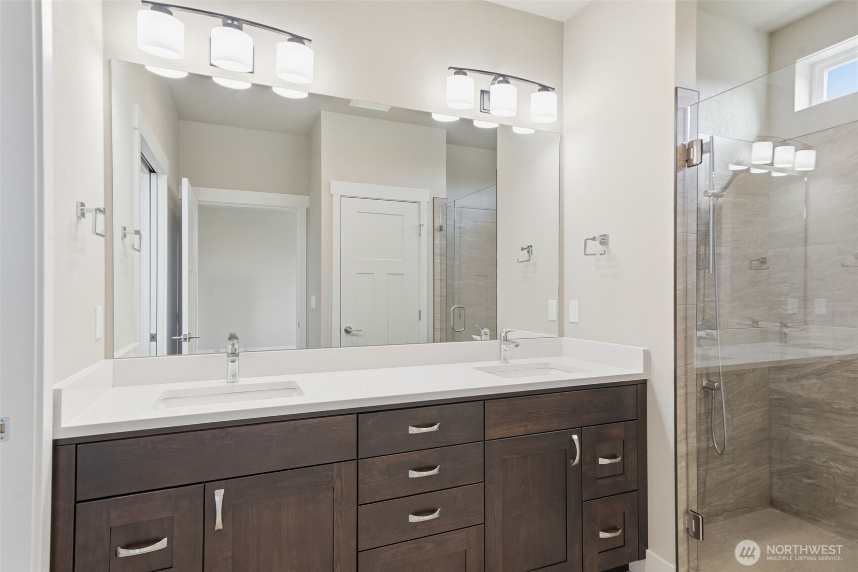 35 Viking Way Sequim, WA 98382 - Photo 23 of 39 a bathroom with a sink double vanity and shower