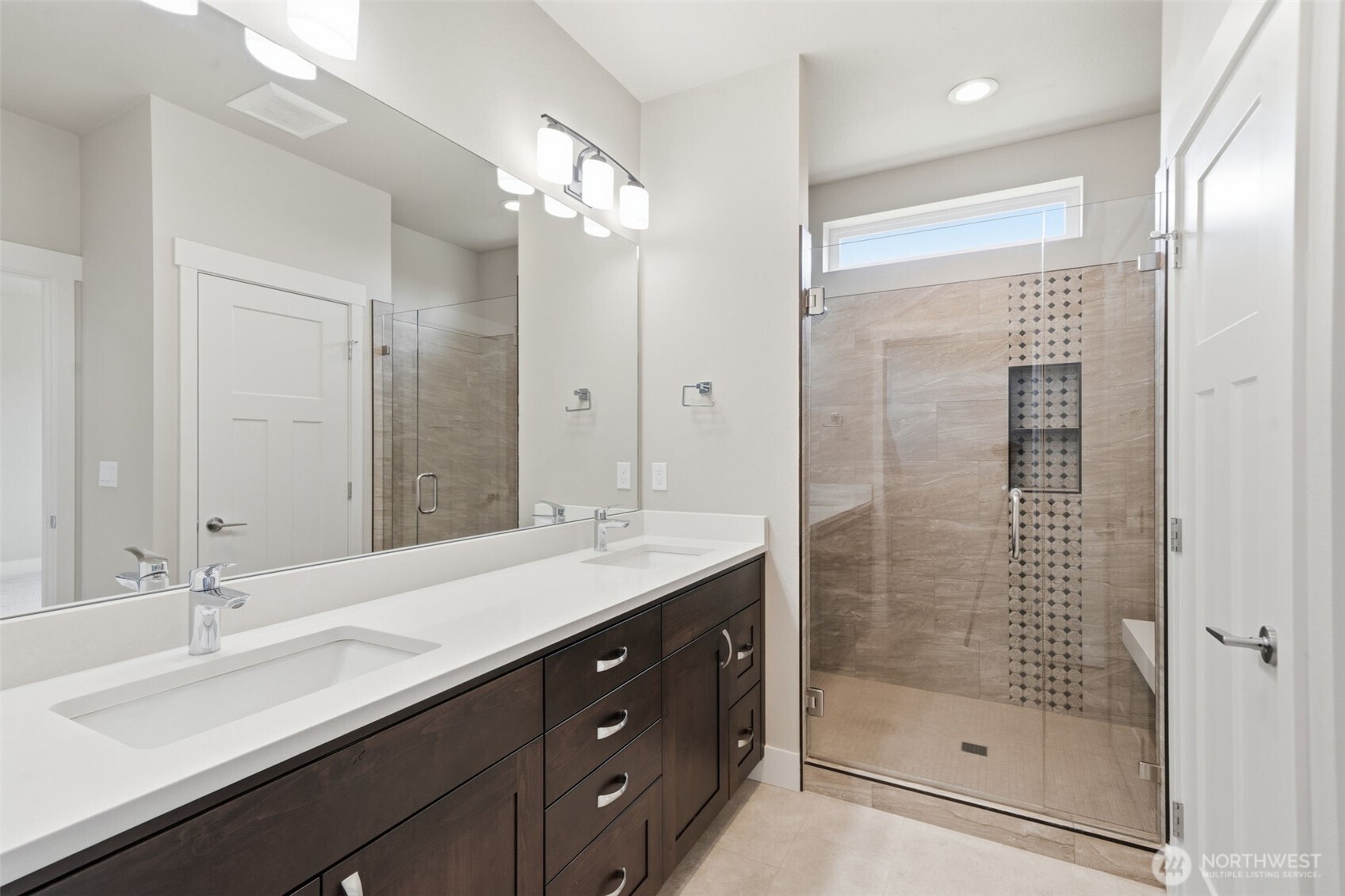 35 Viking Way Sequim, WA 98382 - Photo 24 of 39 a bathroom with a shower sink double and mirror