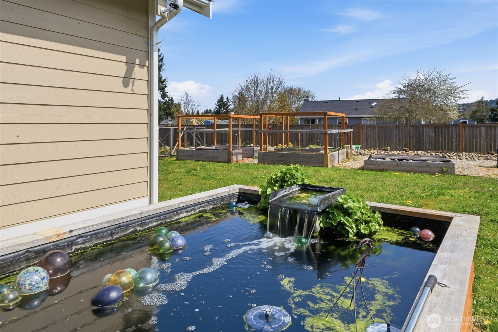 35 Viking Way Sequim, WA 98382 - Photo 34 of 39 a view of a chair and table on the garden