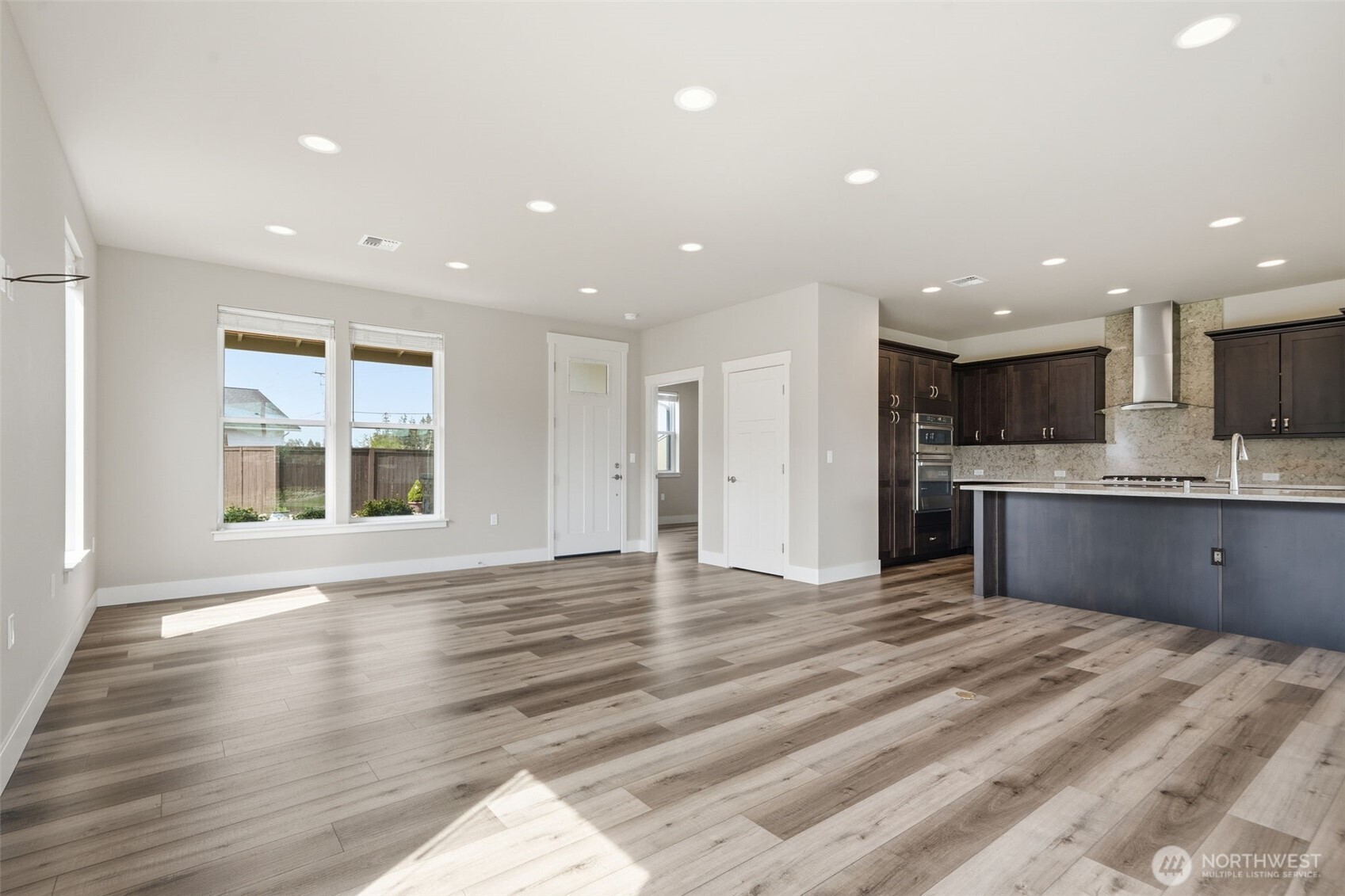 35 Viking Way Sequim, WA 98382 - Photo 7 of 39 a view of kitchen with kitchen island sink and center island