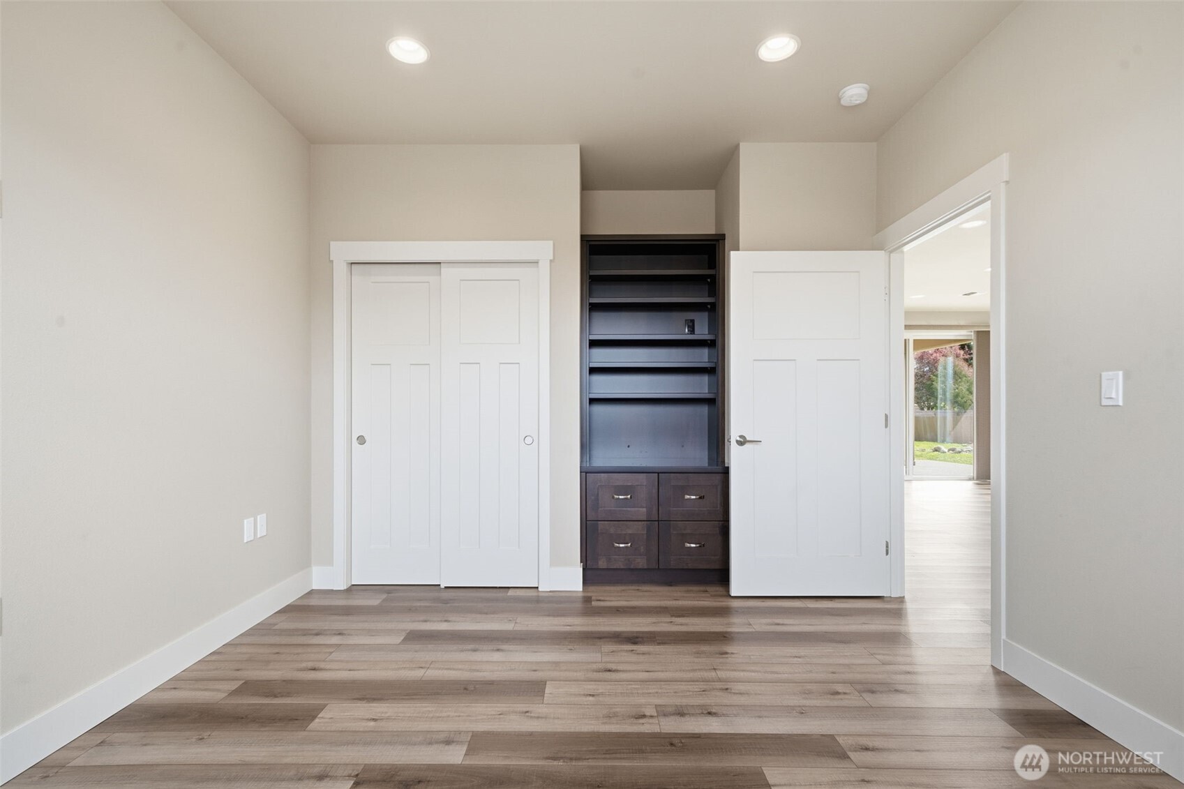 35 Viking Way Sequim, WA 98382 - Photo 9 of 39 a view of empty room with wooden floor and windows