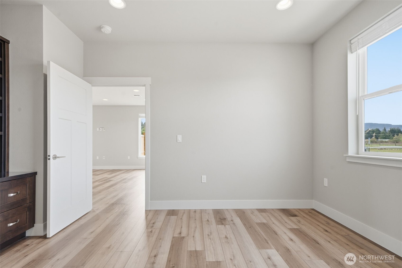 35 Viking Way Sequim, WA 98382 - Photo 10 of 39 wooden floor in an empty room