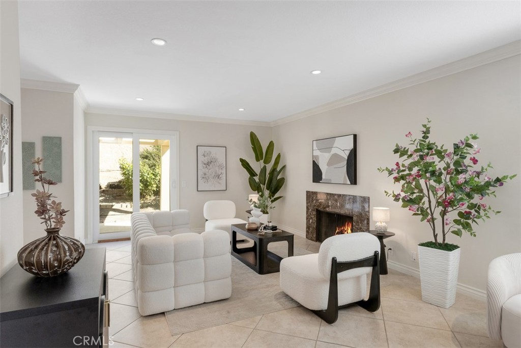 28102 Pinnacles Court Laguna Niguel, CA 92677 - Photo 1 of 30 a living room with furniture potted plant and a fireplace