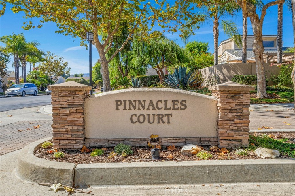 28102 Pinnacles Court Laguna Niguel, CA 92677 - Photo 2 of 30 a sign on the side of a building