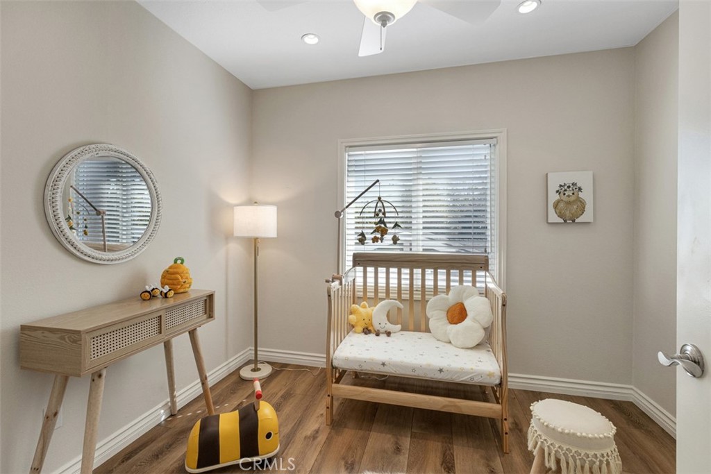 28102 Pinnacles Court Laguna Niguel, CA 92677 - Photo 23 of 30 a bedroom with a bed and a window