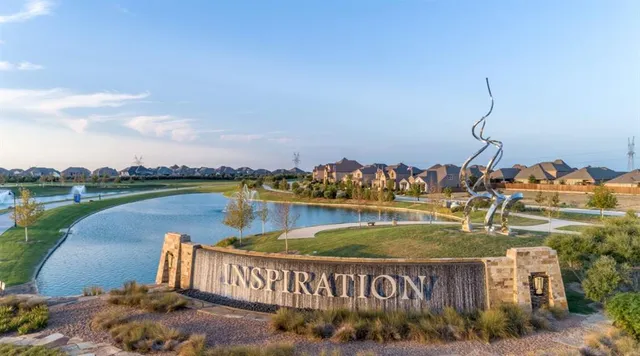 a view of a lake with a building in the background
