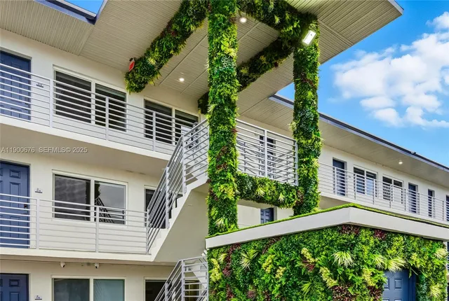 a balcony view with a garden space