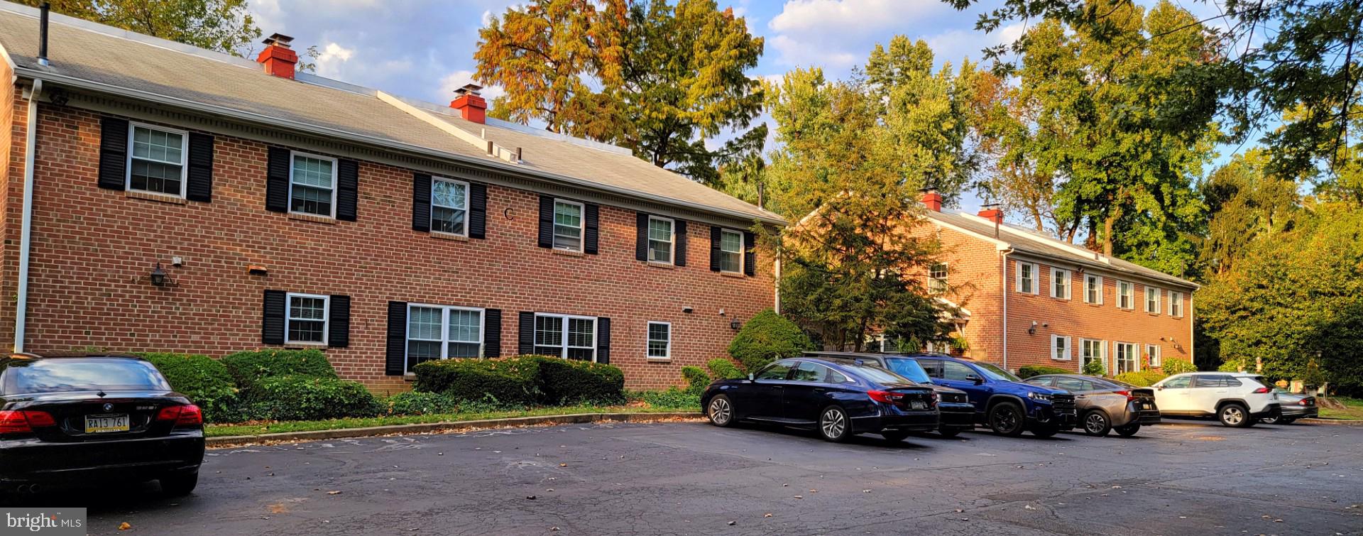 20 Haws Lane, Unit K42 Flourtown, PA 19031 - Photo 3 of 9 a car parked in front of a building