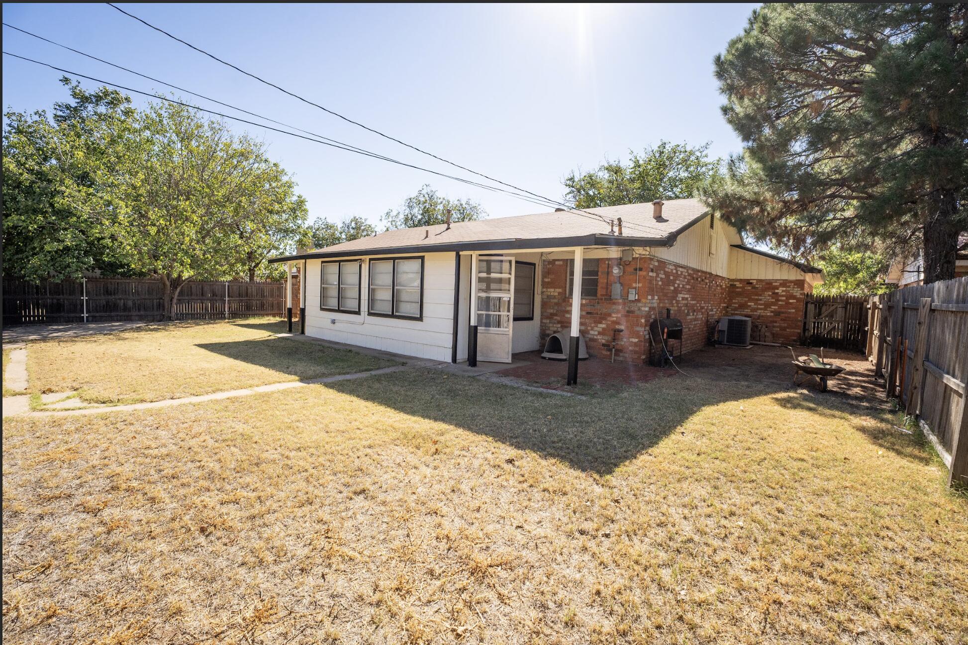 5314 46th Street Lubbock, TX 79414 - Photo 15 of 15 a view of a house with backyard and sitting area