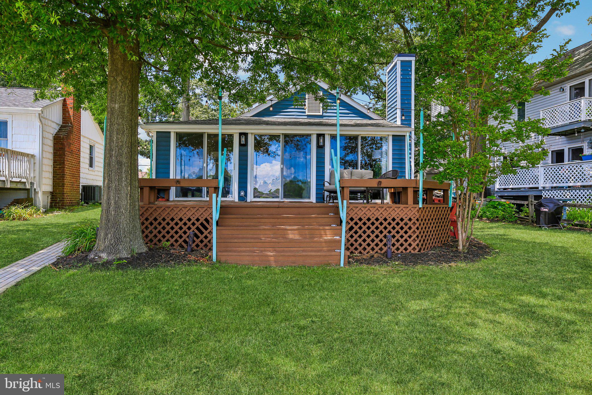 275 Gibson Road Pasadena, MD 21122 - Photo 50 of 59 Charming lakeside retreat with deck.