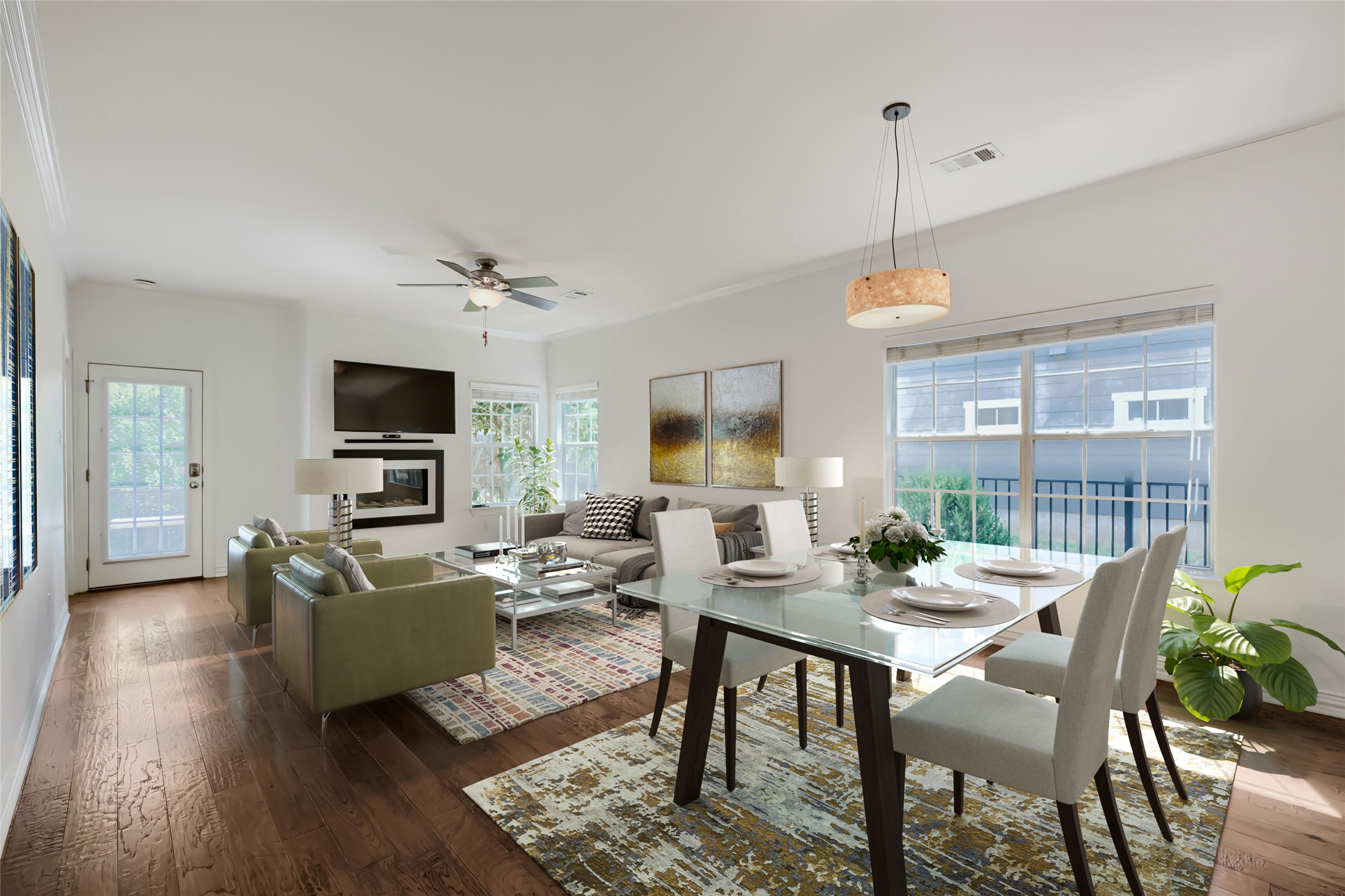 6715 Windrift Way, Unit 28 Austin, TX 78745 - Photo 5 of 19 Virtually staged living and dining space, open-concept with upgraded hardwood floors