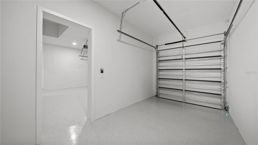 9 Tee View Road Rotonda West, FL 33947 - Photo 35 of 38 a view of closet area with empty racks