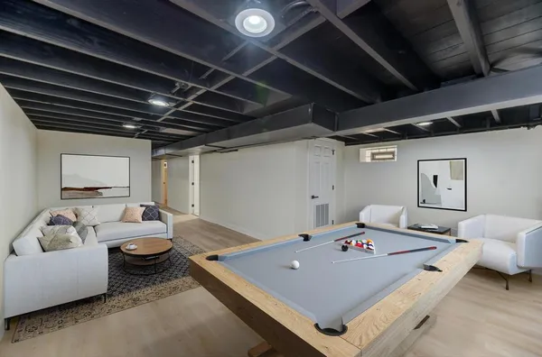 a living room with furniture and a table
