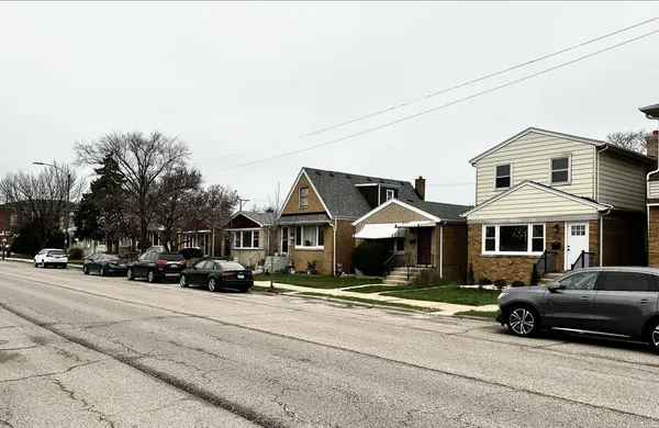 a car parked in front of a house
