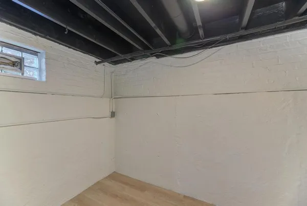 a view of a room with racks on the wall
