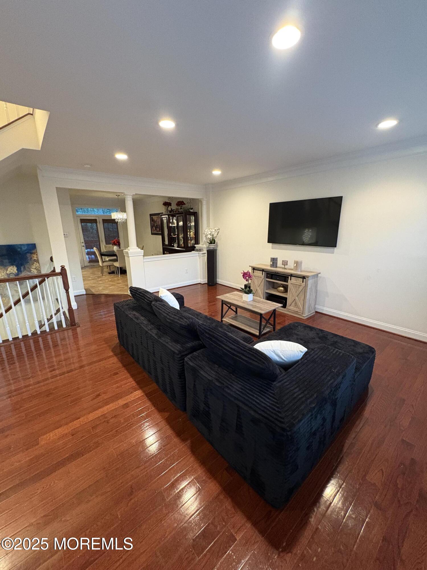 63 Pate Drive Middletown, NJ 07748 - Photo 12 of 50 a living room with furniture and a flat screen tv